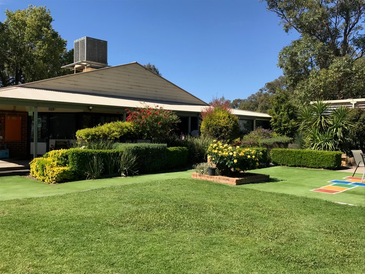Picture of school building and garden